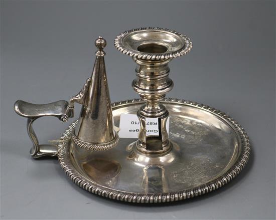 A George III silver chamberstick and extinguisher, by William Stroud, London, 1815, 14.5cm.